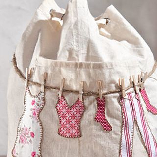 Laundry bag with fabric appliqués