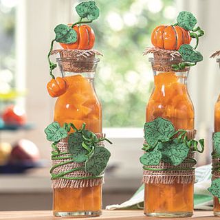 Skleněné láhve s dýňovými ozdobami z FIMO
