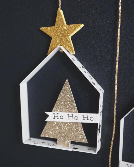 Weihnachtliche Häuser aus Glitterpapier selber basteln