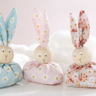 Homemade fabric bunny with wooden ball