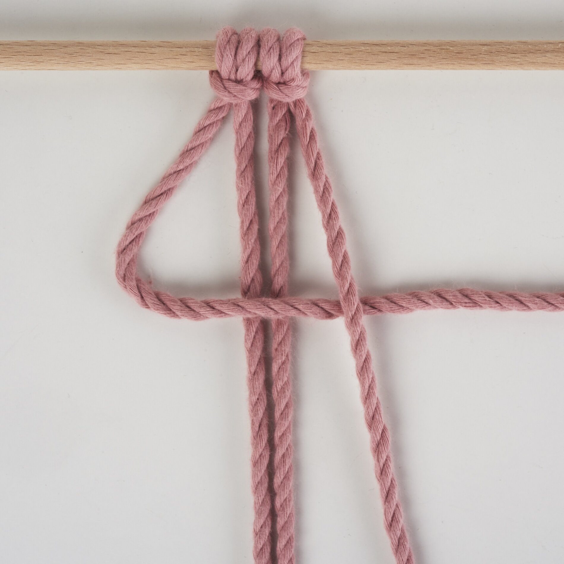 Kreuzknoten nach links gerichtet 1