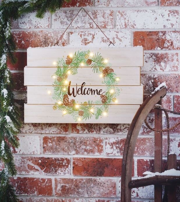 Dekoratives Schild mit weihnachtlichem Motiv