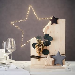 stern auf holzsockel