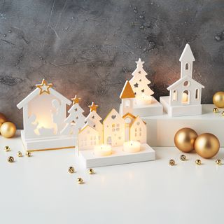 Gegossene beleuchtete Weihnachtsszene