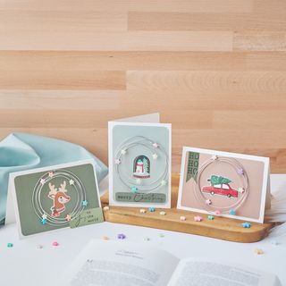 Vánoční přání s drátěnými věnci