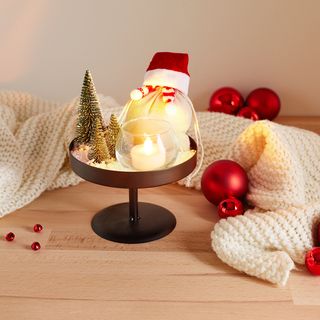 Metal items decorated for Christmas&mdash;etagere