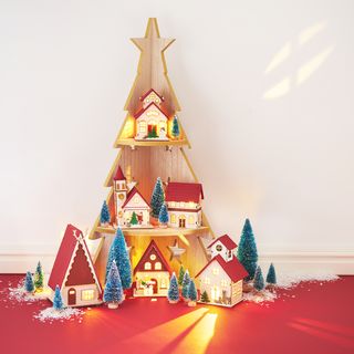 Christmas "-etagere " with illuminated houses