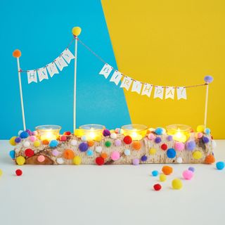 Birthday arrangement with pennant chain