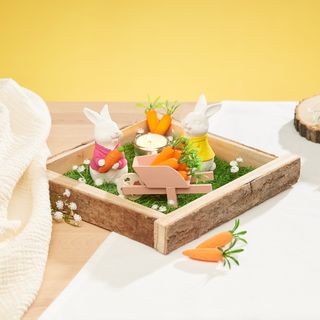 Gegossene Hasen in Miniaturlandschaft