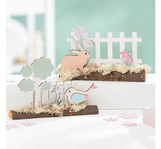 VBS Wooden building kit on tree trunk