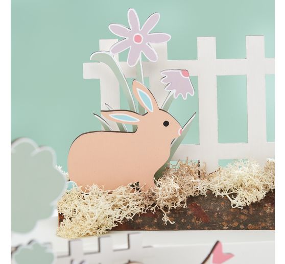 VBS Wooden building kit on tree trunk