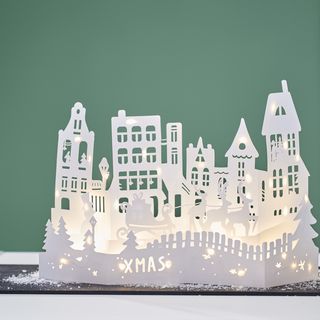 Osvětlená papírová silueta